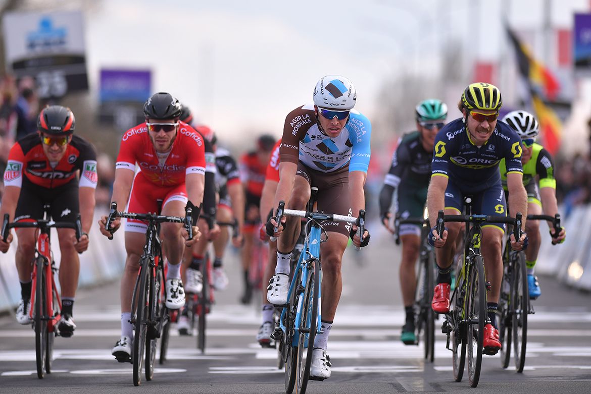 A dejected peloton comes inf or fifth