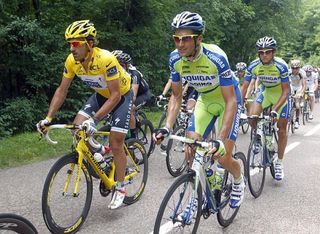 Race leader Fabian Cancellara (Saxo Bank) rides alongside 2010 Giro d'Italia winner Ivan Basso.