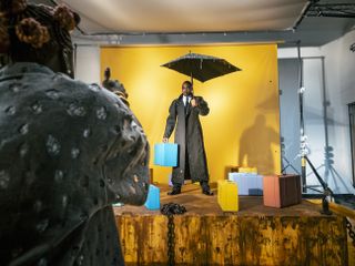 Idris Elba holds umbrella to pose for Pirelli Calendar 2024