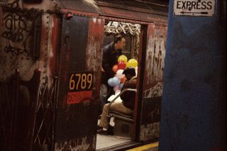 Balloons in the subway, 1984, by Frank Horvat