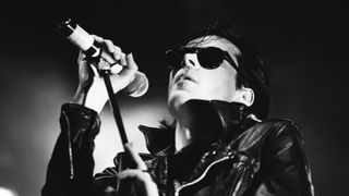 Andrew Eldritch of gothic rock band Sisters Of Mercy performs on stage, Wembley Arena, London, United Kingdom, 26th November 1990