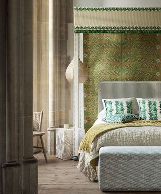 An example of bohemian bedroom ideas showing a light and airy bedroom design in neutral colors inspired by grand Rajasthan interiors