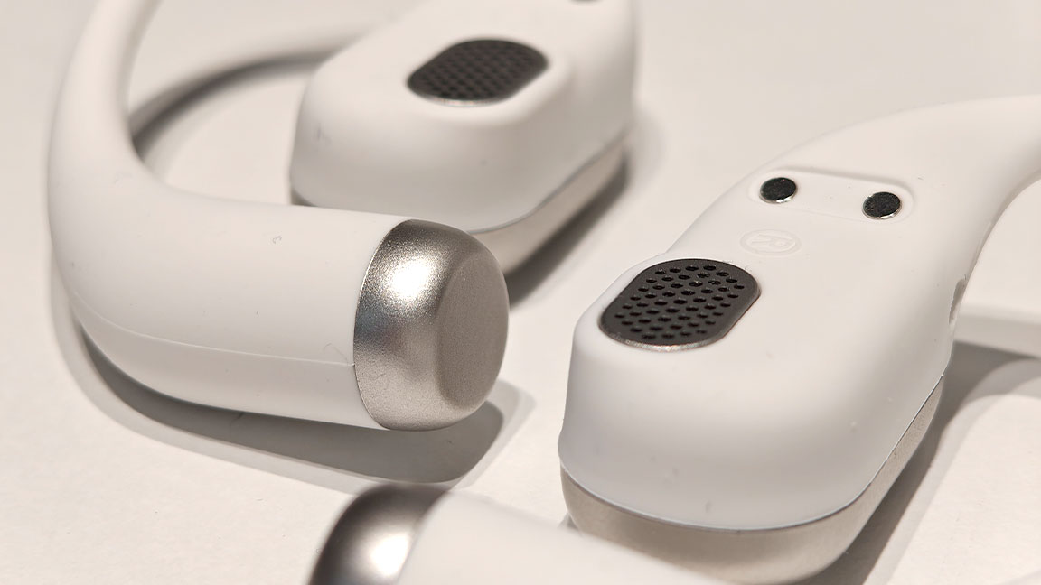 Ugee FreSound; open earbuds on a white table