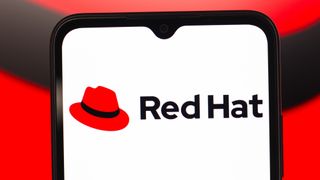 Red Hat Linux logo on a smartphone.