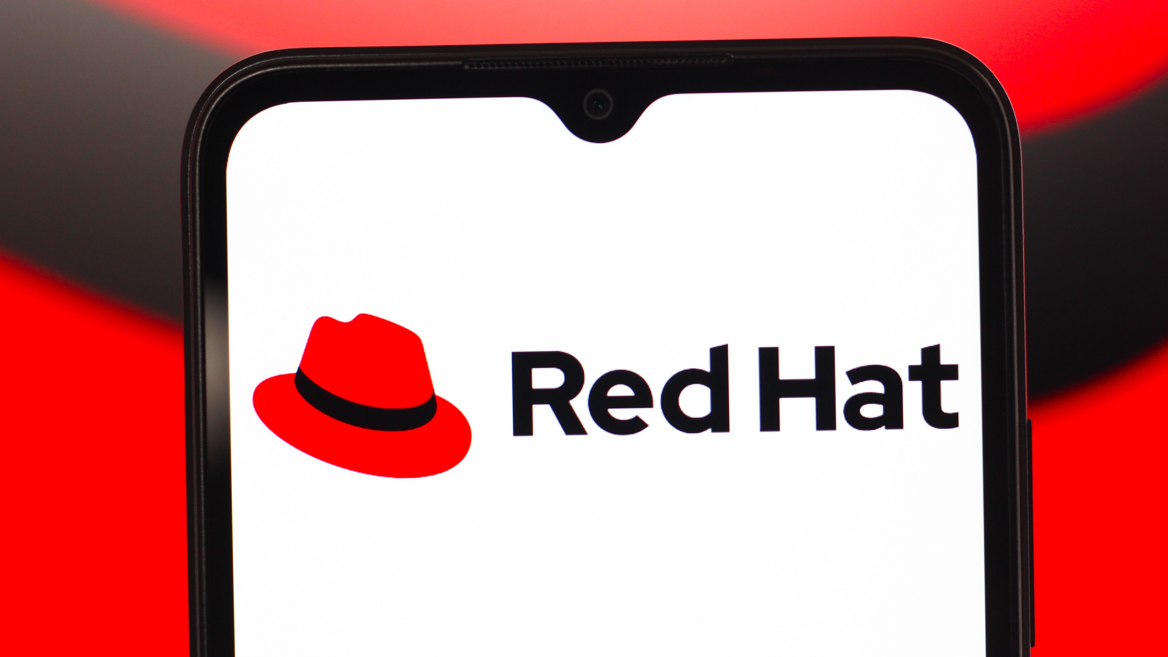 Red Hat Linux logo on a smartphone. 
