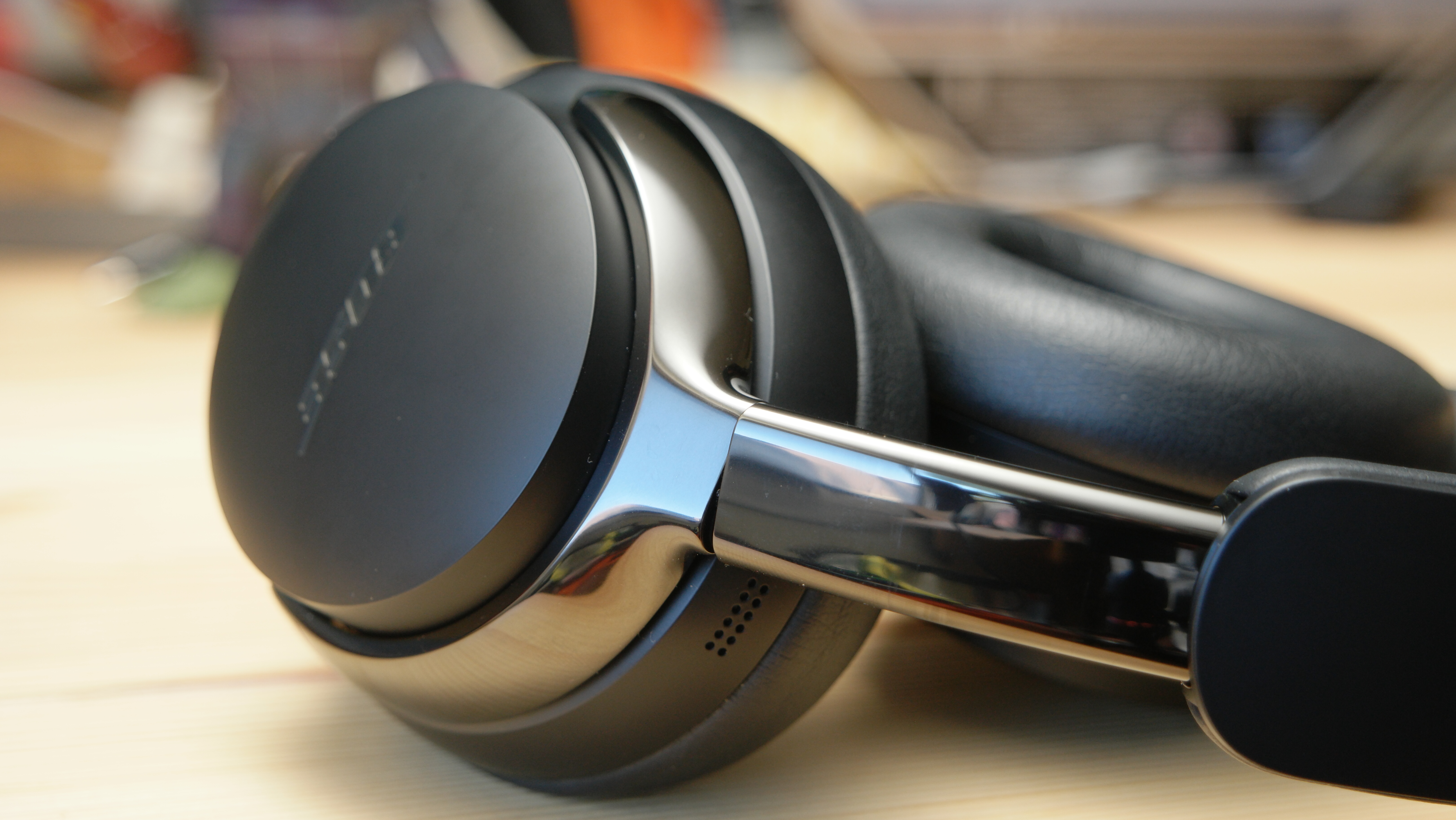 Bose QuietComfort Ultra Headphones (2nd Gen) close up of the new polished metal ear cup yokes