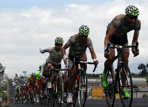 Boyaca Orgullo De America riders on the front.