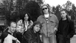 Marillion standing in a park