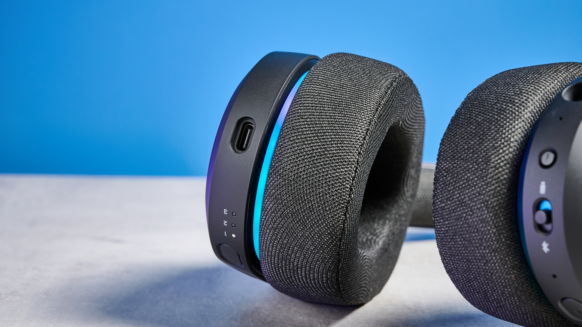 The Fractal Design Scape on a stone surface with a blue background