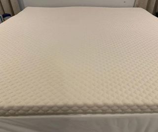 Nolah Mattress Topper on a bed.