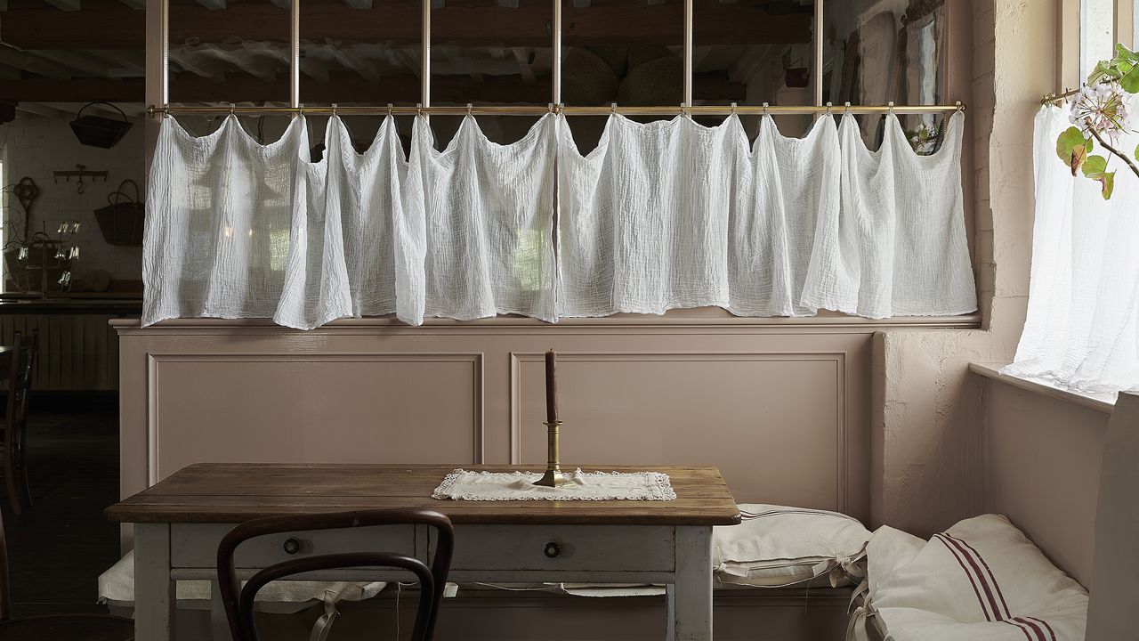 deVol cafe curtain brass rail and curtain in a kitchen