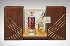 A bottle of whisky in a crystalo decanter and presentation case