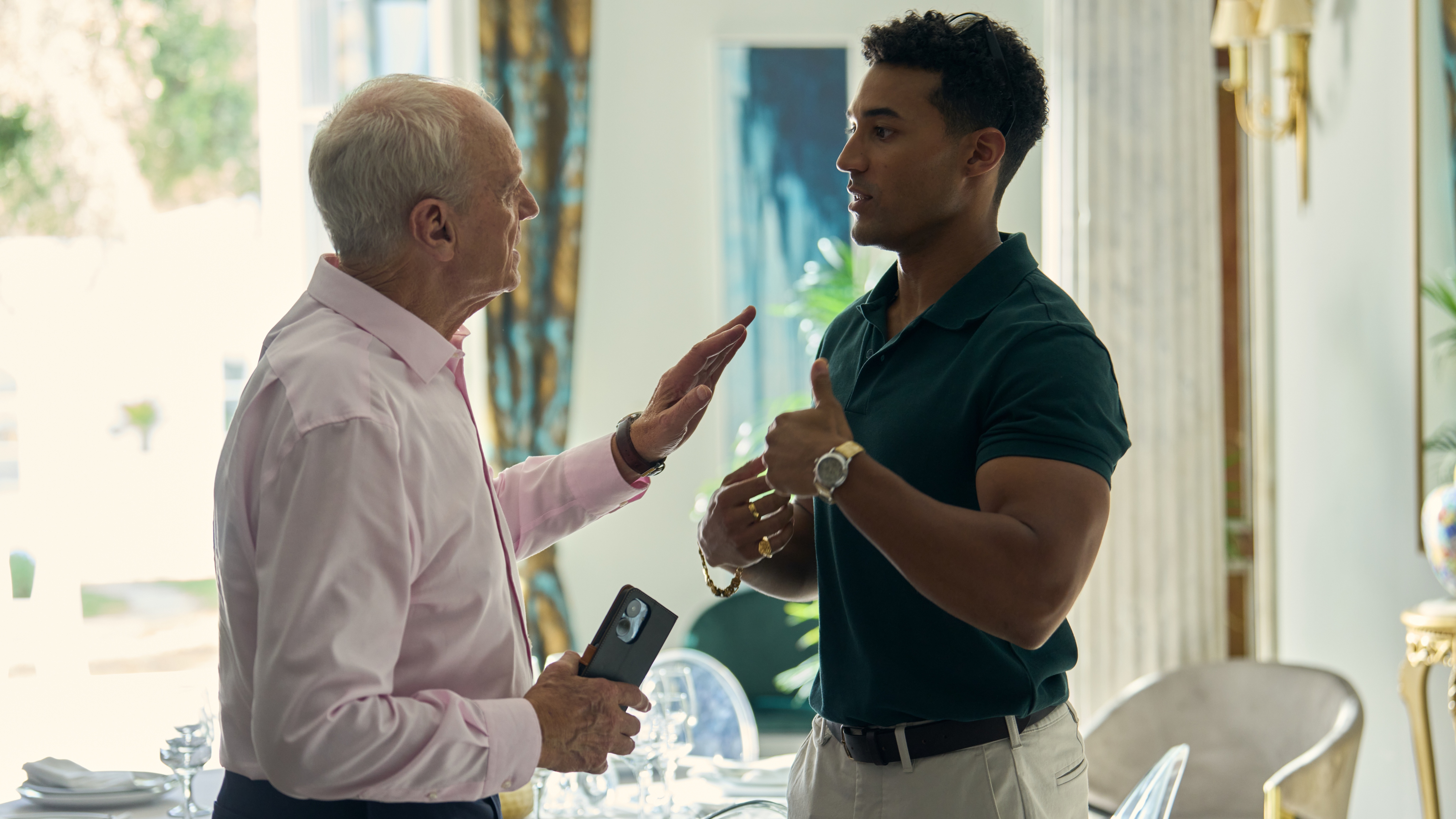 Aaron dismissing Ezra as he tries to ask him a question in their very fancy french house.