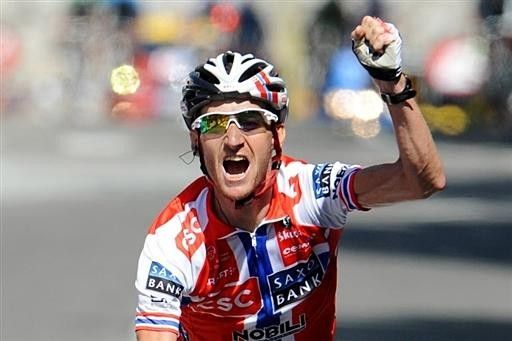 Kurt-Asle Arvesen (CSC-Saxo Bank) was sure he had the win, but it came down to a photo finish.
