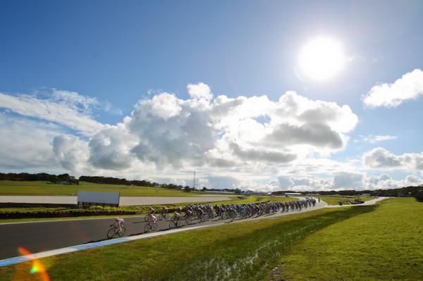 The peloton speeds along the Phillip Island Grand Prix circuit