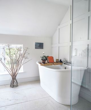 White bath, white panel walls