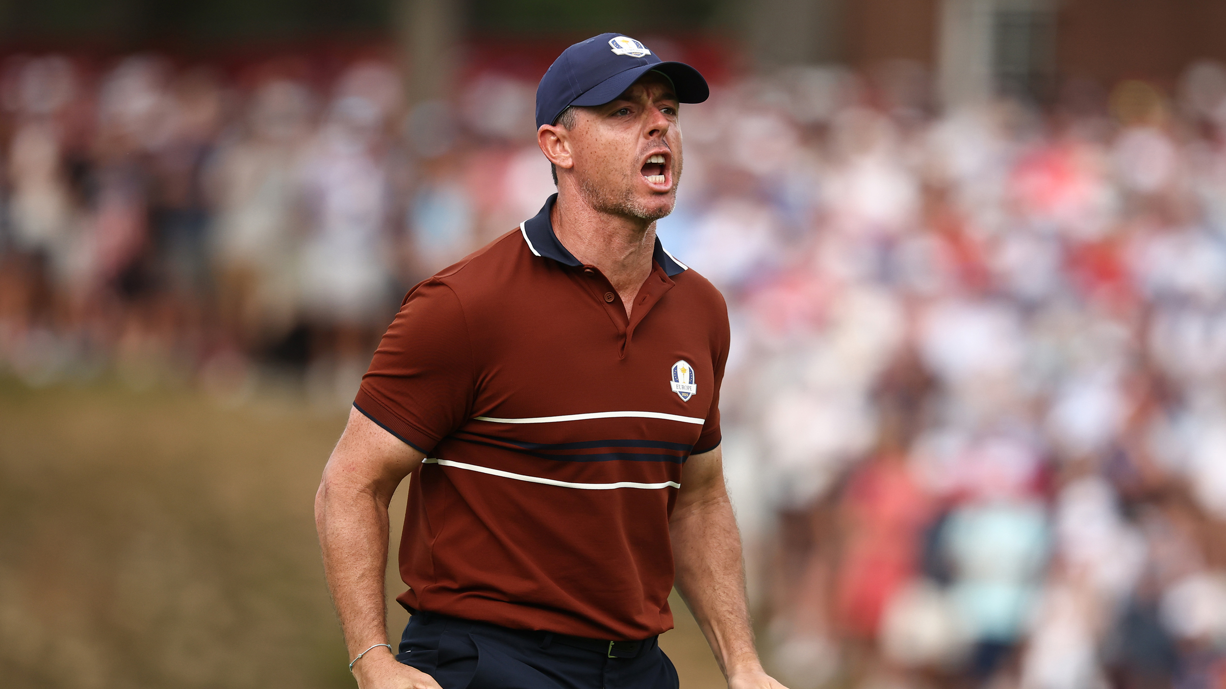 Rory McIlroy celebrates after holing a putt at the 2025 Ryder Cup