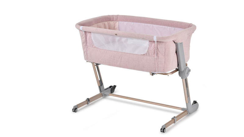 pink bedside crib for home and travel