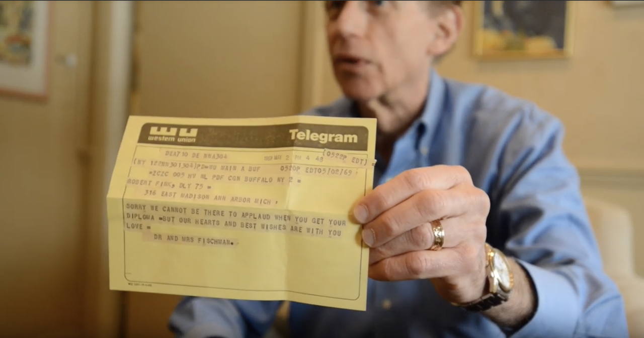 Robert Fink holds his long-lost telegram.