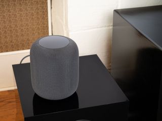 Photograph of the HomePod in a living room