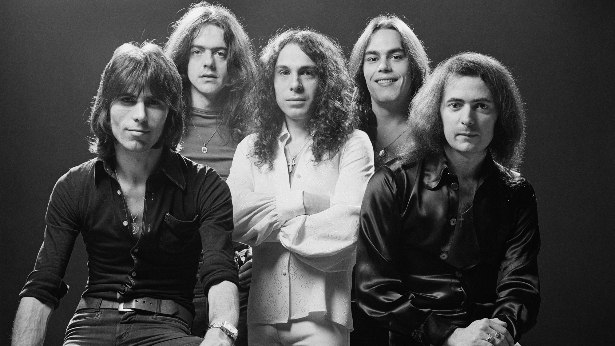 Rainbow 1976 pose for the cover of Rising: (from left) drummer Cozy Powell, bassist Jimmy Bain, singer Ronnie James Dio, keyboardist Tony Carey, and guitarist Ritchie Blackmore