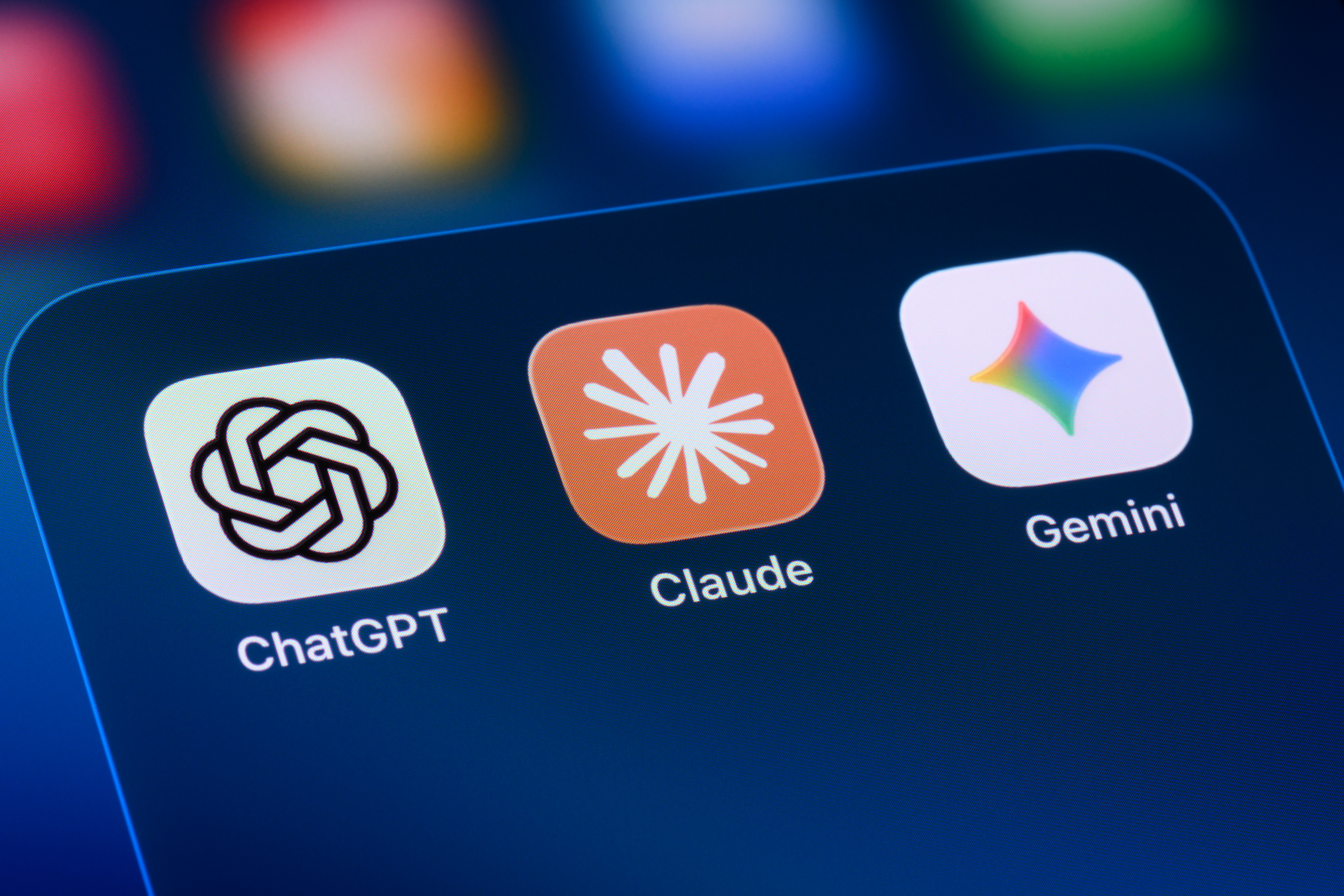 AI assistant apps on a smartphone with OpenAI ChatGPT first, Claude and Gemini.