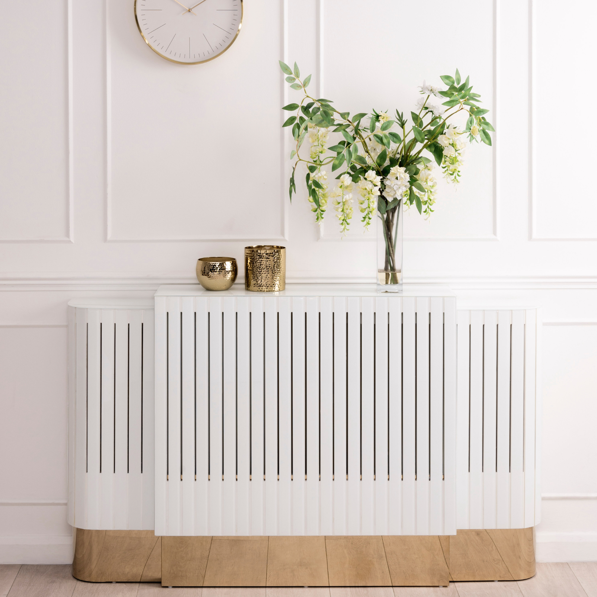 white panelled hallway with matching radiator cover