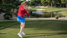 Katie Dawkins taking a practice swing