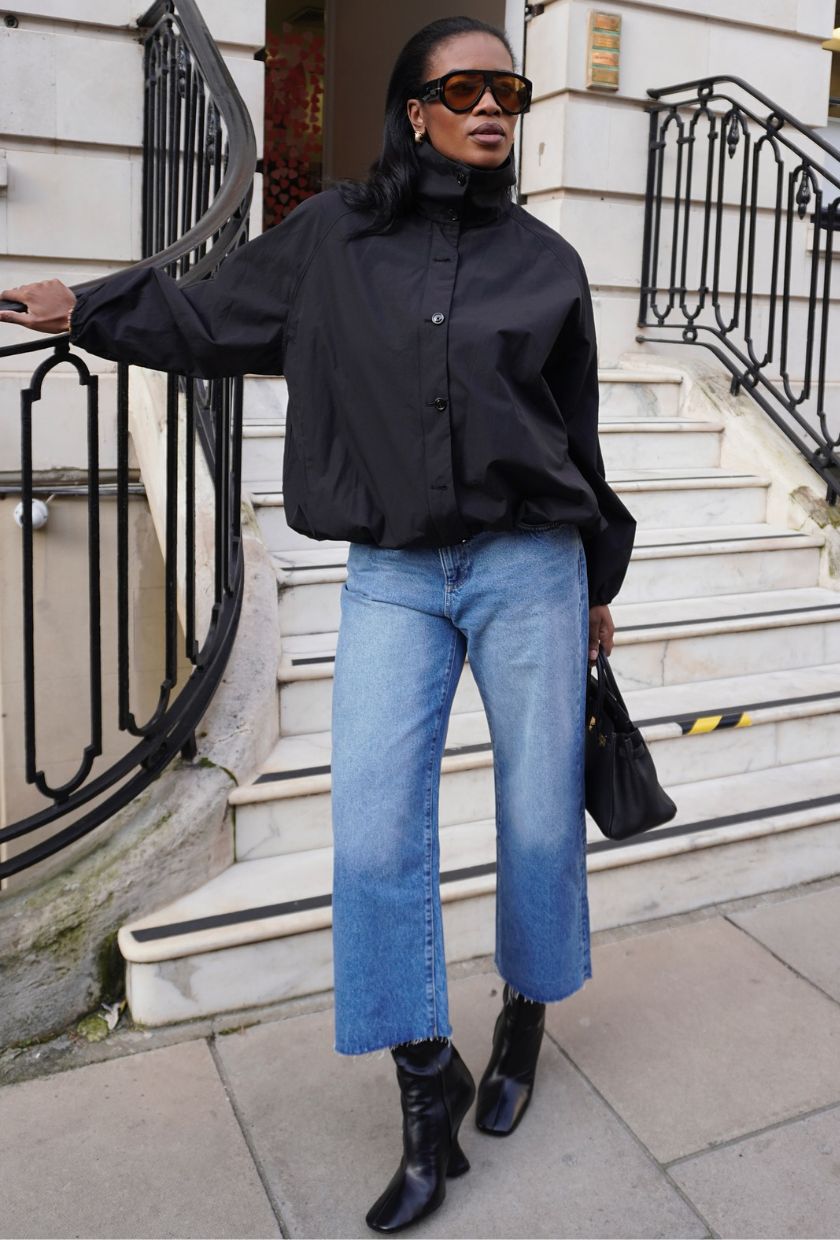 @nlmarilyn wears a funnel-neck jacket