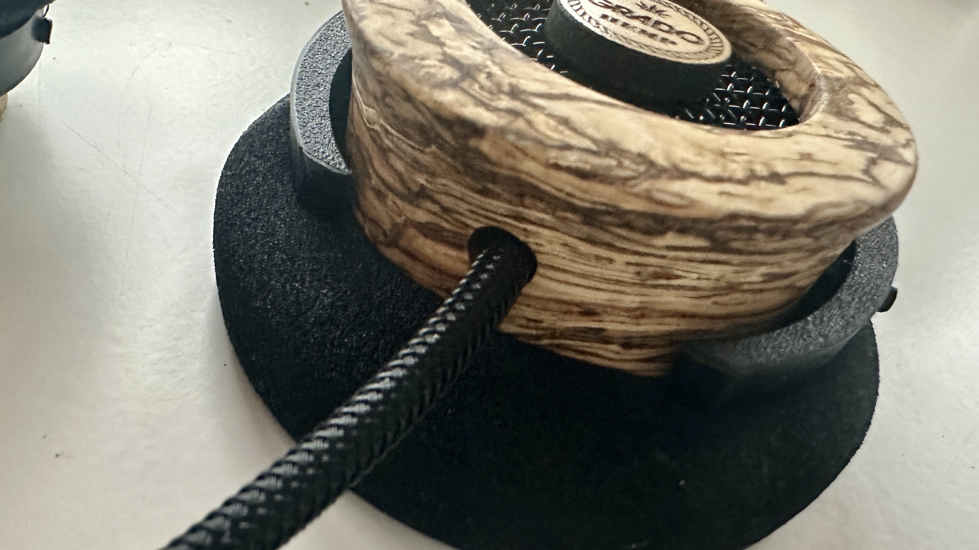 A closeup of Grado's cable on the Hemp wooden earcup