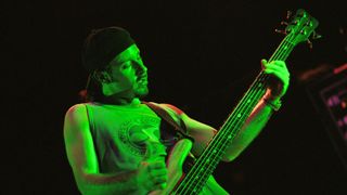 Bass player Dirk Lance performs live with his funk-metal band, Incubus at the Santa Barbara County Bowl October 20, 2000 in Santa Barbara, CA.