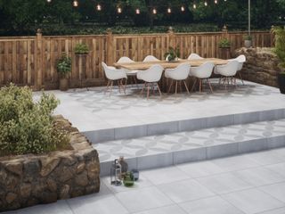 patterned floor tiles used in an outdoor dining space