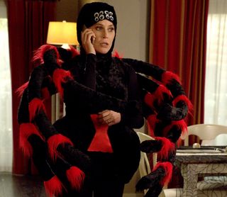 Julie Bowen dressed up as a spider as horror-loving Claire in Modern Family.