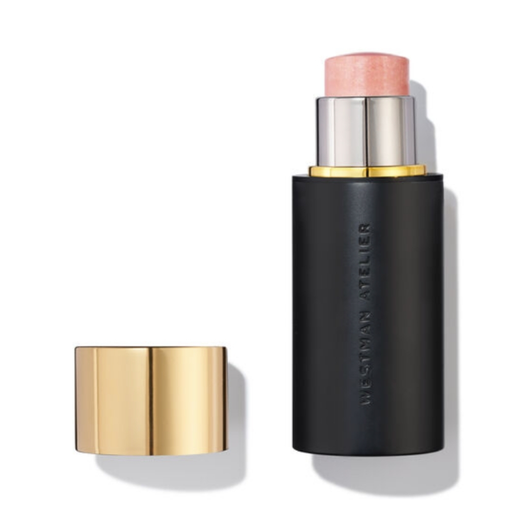 A product shot of the Westman Atelier Lit Up Highlight Stick, on a white background