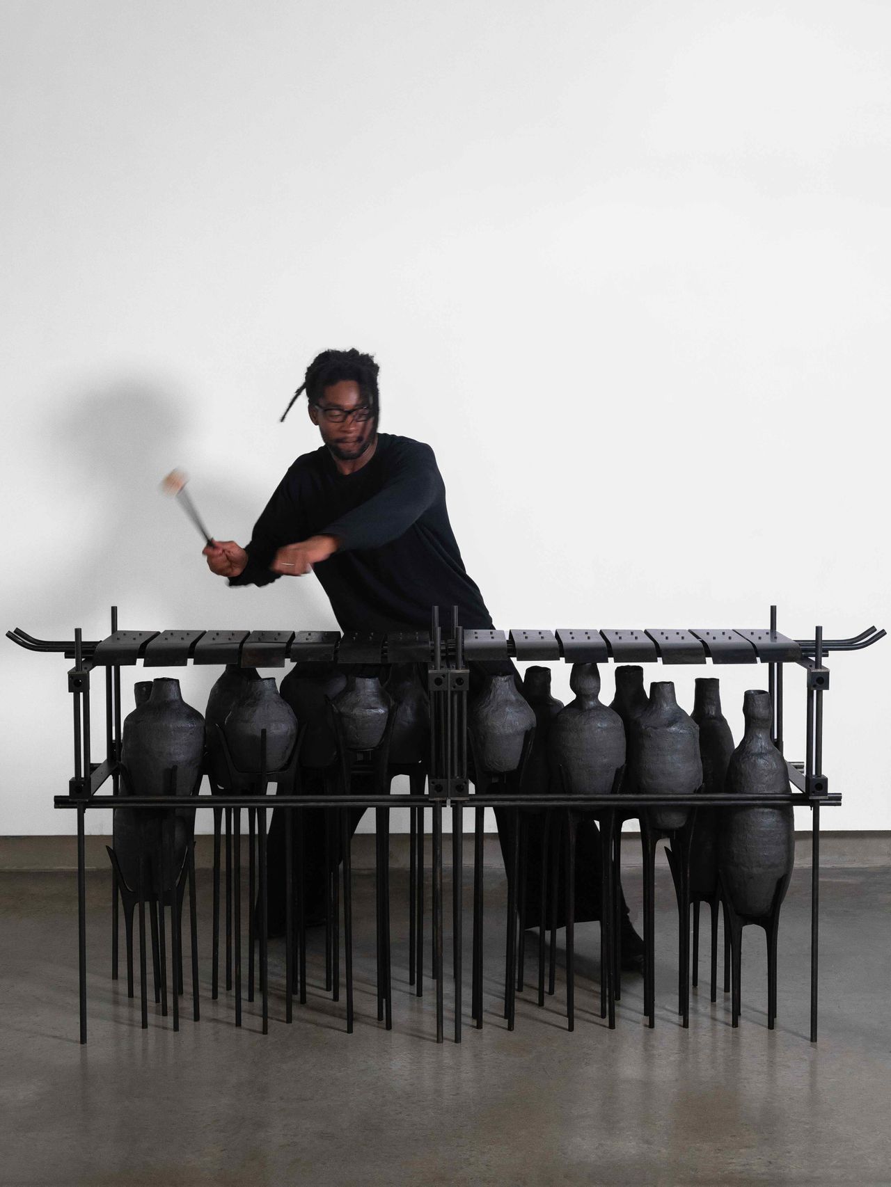 Giles Tettey Nartey pictured playing his work &lsquo;Strange Notes&rsquo;