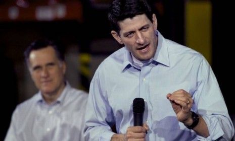 Paul Ryan, (R-Wis.) addresses an audience at an oil company in Milwaukee as Mitt Romney looks on: Romney may be interested in Ryan as one of his top three choices for a VP nominee, but Ryan&amp;#039;s