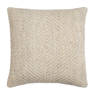 tan throw pillow with geometric pattern