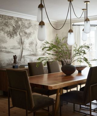 Large wooden dining table with brown chairs