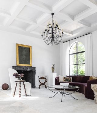 White living room with panelled ceilings