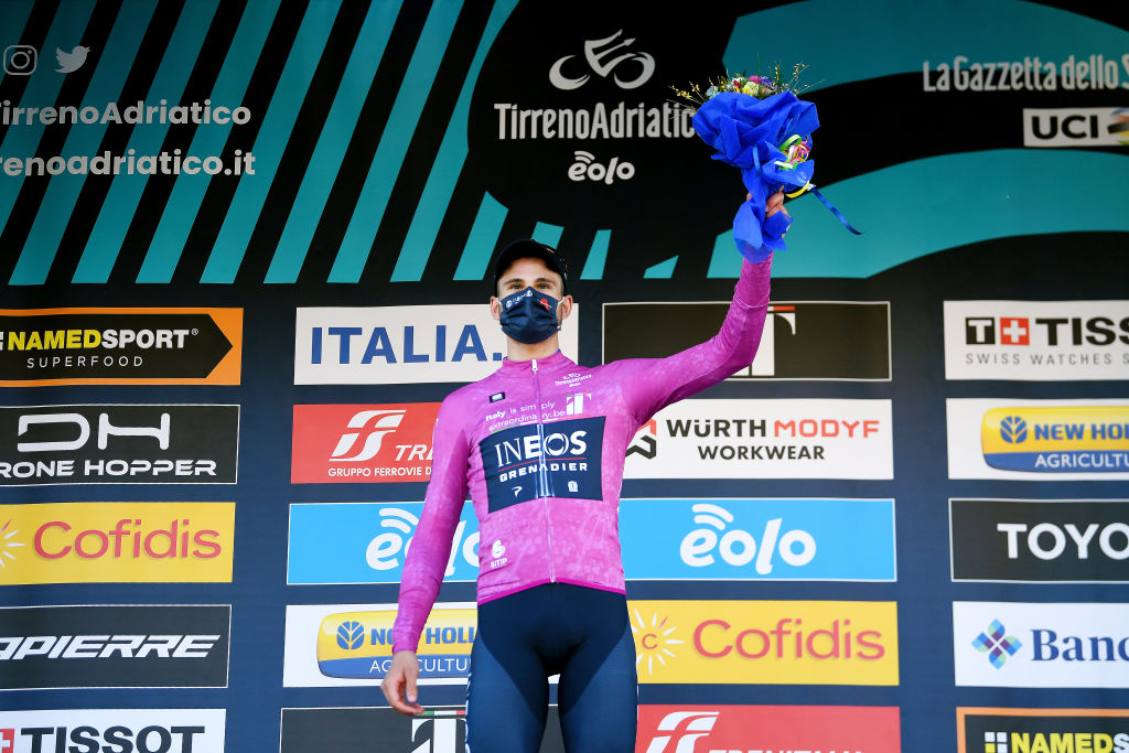CAMAIORE ITALY MARCH 07 Filippo Ganna of Italy and Team INEOS Grenadiers celebrates winning the purple sprint jersey on the podium ceremony after the 57th TirrenoAdriatico 2022 Stage 1 a 139km individual time trial from Lido di Camaiore to Lido di Camaiore TirrenoAdriatico on March 07 2022 in Camaiore Italy Photo by Tim de WaeleGetty Images