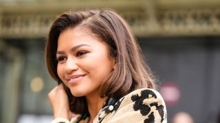 zendaya on the street with a side parted bob