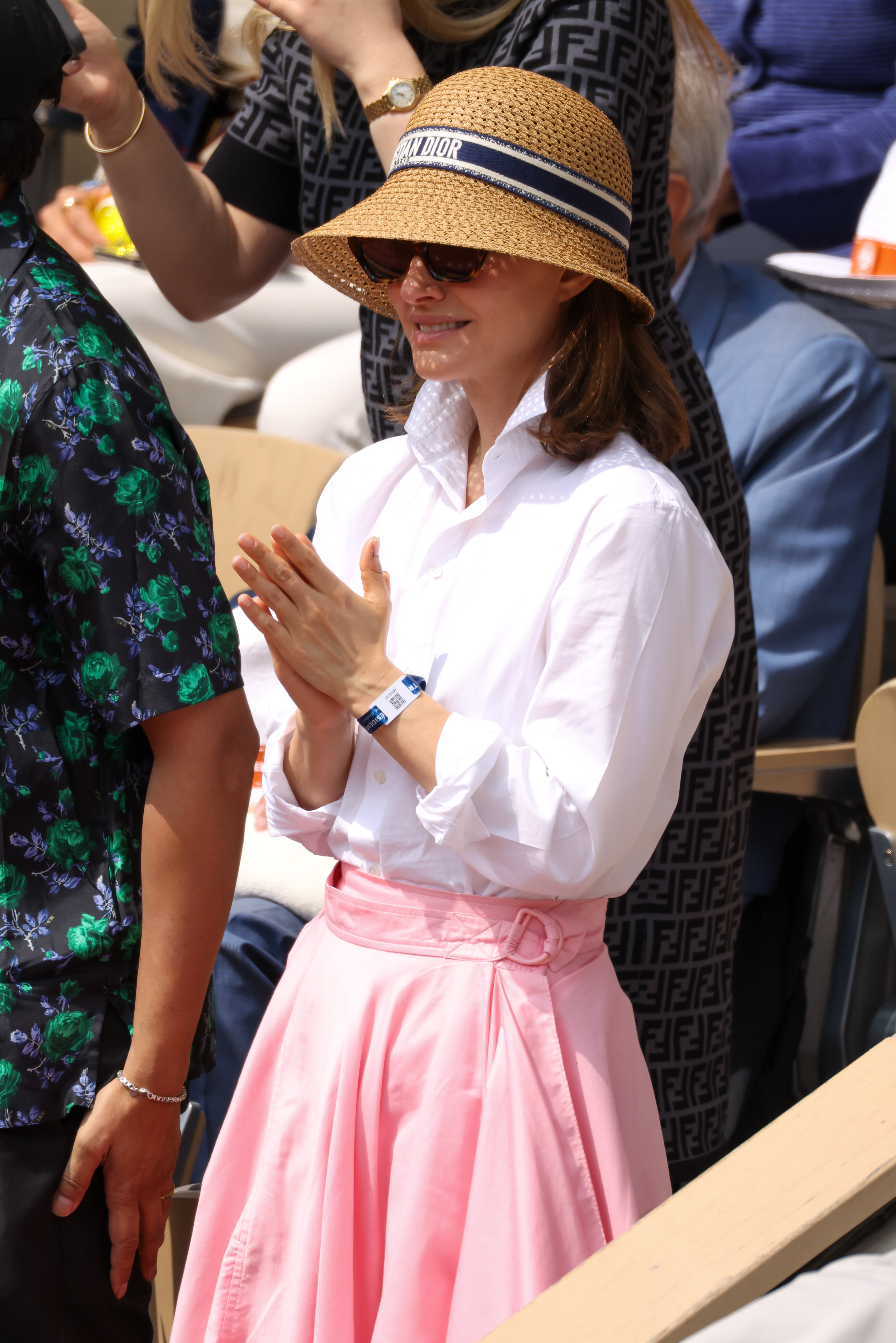 Natalie Portman wears a pink skirt