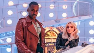 Ncuti Gatwa as the Doctor and Millie Gibson as Ruby Sunday staring at the camera inside the TARDIS in a promotional image for Doctor Who season 1