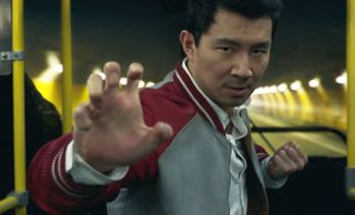 Simu Liu in a fighting pose from Marvel film Shang-Chi and the Legend of the Ten Rings