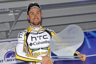 Bernhard Eisel (HTC - Columbia) shows off his Gent - Wevelgem winner's trophy.