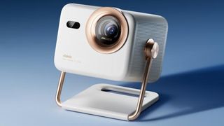 Product shot of the Hisense M2 Pro mini projector on a blue surface