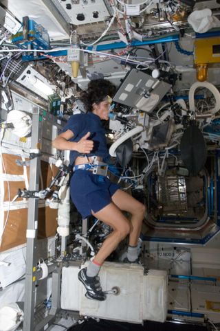 NASA astronaut Sunita Williams performs a cardiopulmonary exercise test while using the Cycle Ergometer with Vibration Isolation System at the International Space Station.