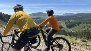 Gravel and MTB rider on mountain fire road