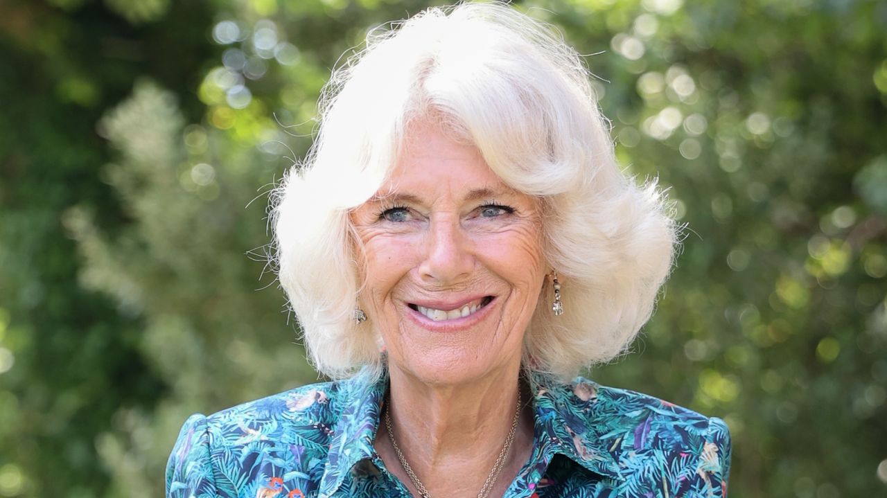 Duchess Camilla smiles as she visits Five Islands Academy School for an Eco Conference