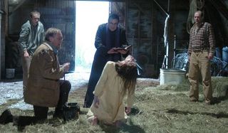 The Exorcism of Emily Rose Tom Wilkinson Jennifer Carpenter mid-exorcism in the barn